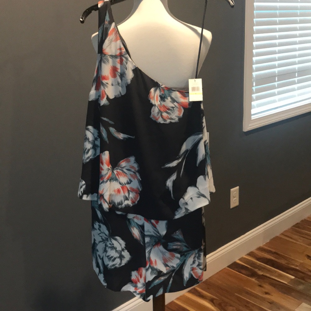 NWT one shoulder romper. Size 4